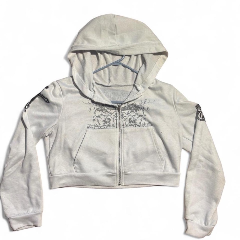 White zip-up Urban Couture cropped jacket.